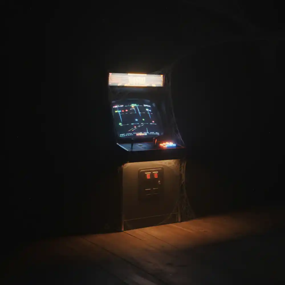 Glowing arcade cabinet evoking vector space shooters